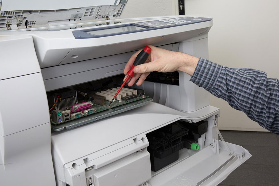 Repairing an ID card printer in the office