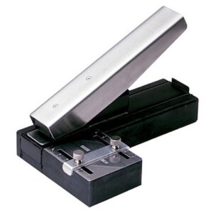 Stapler-Style Slot Punch with Adjustable Guide
