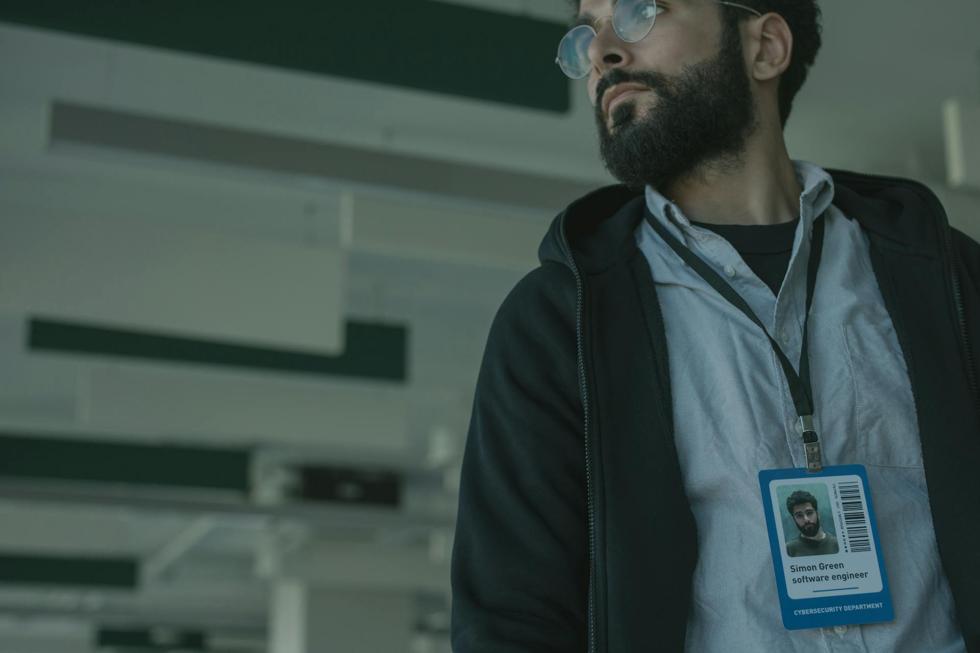 man wearing a lanyard at work