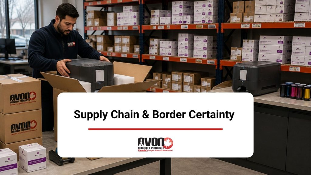Avon Security Products employee packing an ID card printer for shipment in a Canadian warehouse stocked with card printing supplies